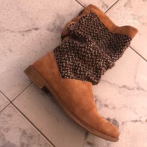 Toms boots with gold suede foot and brown cloth shaft that is slight slouched.